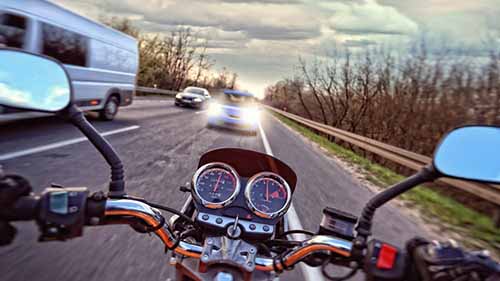 Moment before a motorcycle crash. If you need a Garden City motorcycle accident lawyer, call Cellino Law today. 