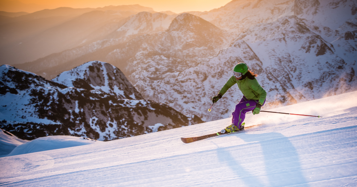 Person skiing down a ski slope