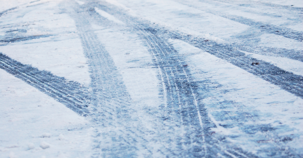 Tire tracks on snowy Buffalo road