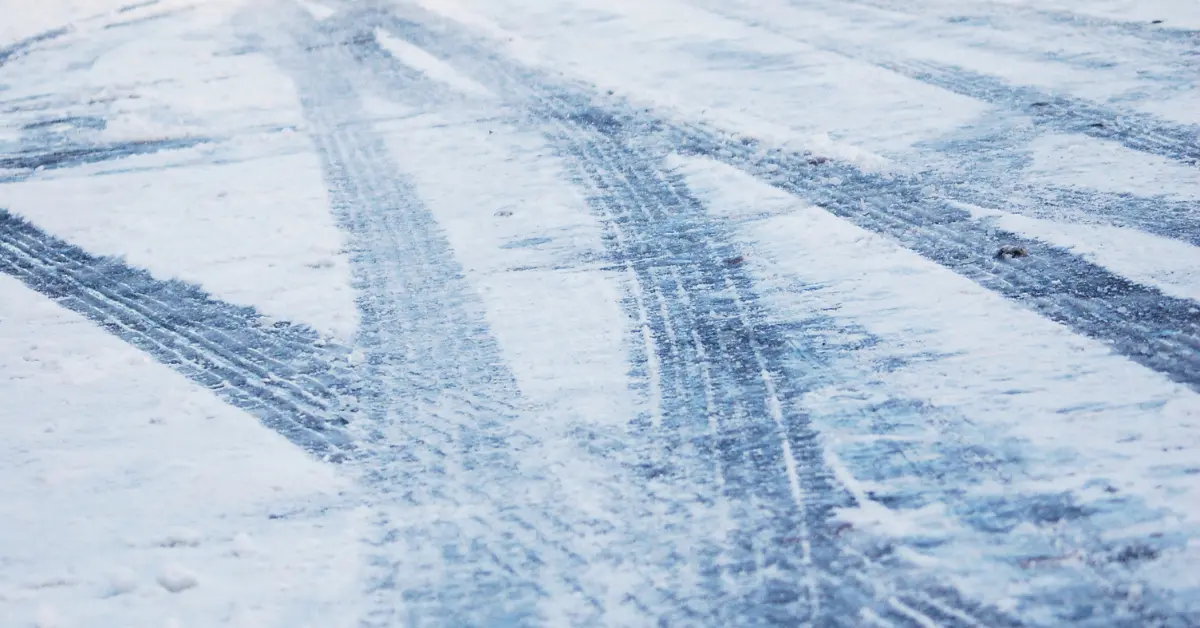 Tire tracks on snowy Buffalo road